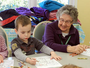 Seniors Drawing with Kids